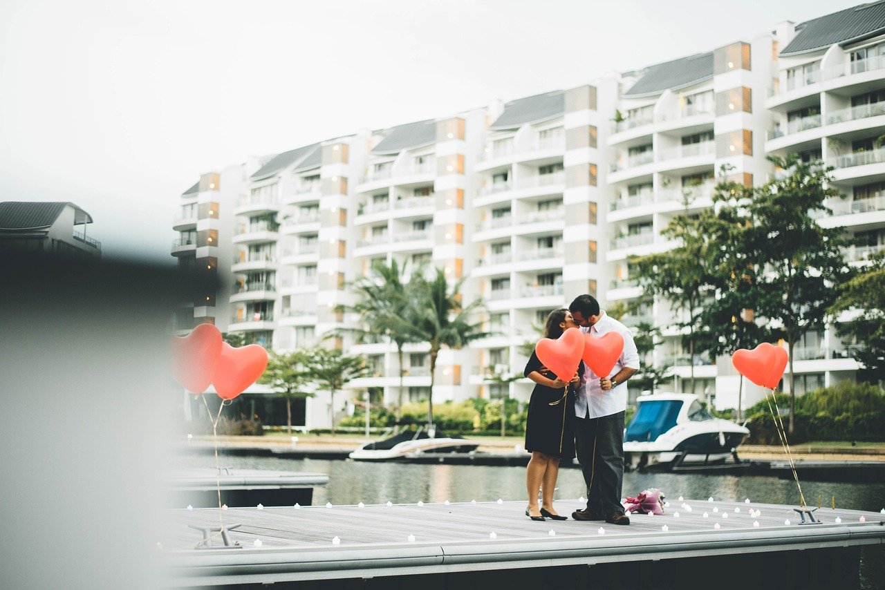 building, condominium, structure, tree, water, balloon, heart, people, couple, nature, man, woman, kiss, condominium, condominium, condominium, condominium, condominium